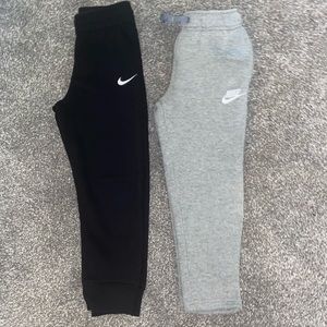 2 pairs of Nike sweatpants